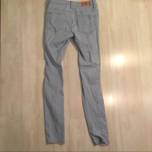 Light blue ripped skinny jeans